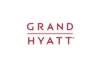 Grand Hyatt logo in red uppercase letters with a horizontal line separating 'GRAND' and 'HYATT' on a white background.